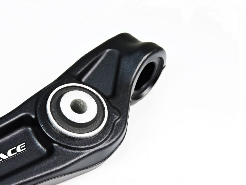 Close-up of a black bicycle crank arm with 'Shimano' branding on a white background