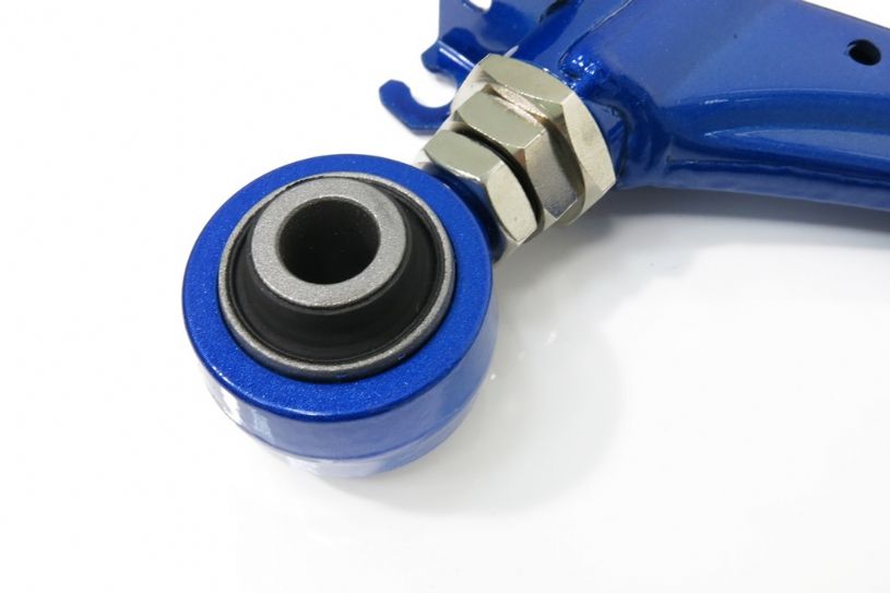 Close-up of a blue mechanical component with a bearing on a white background