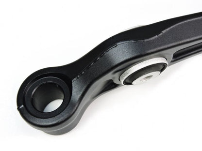 Close-up of a black metal mechanical component on a white background